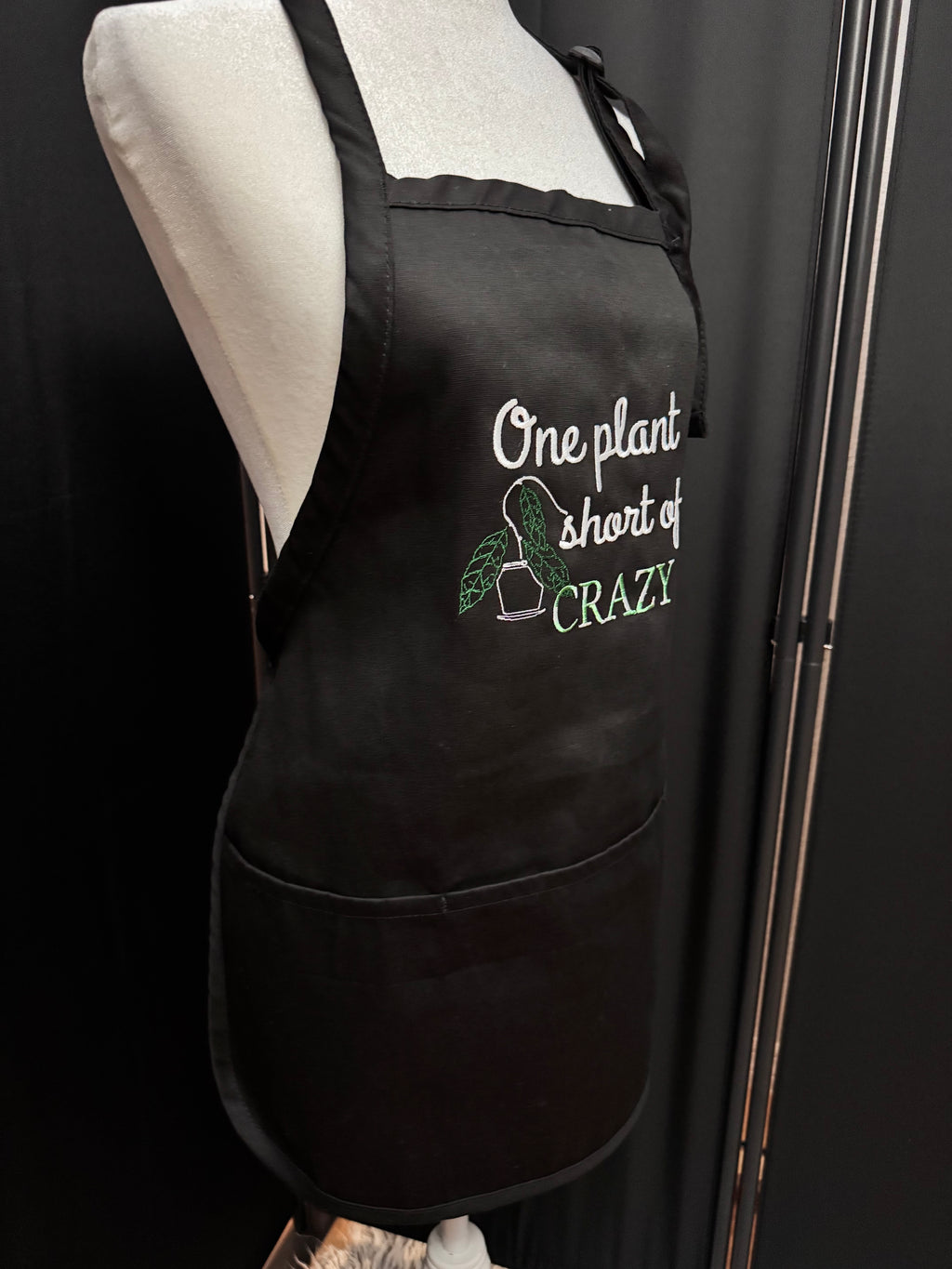 Apron with Pockets - adjustable straps - Embroidered "One Plant Short of Crazy w/Hoya Clemensorium