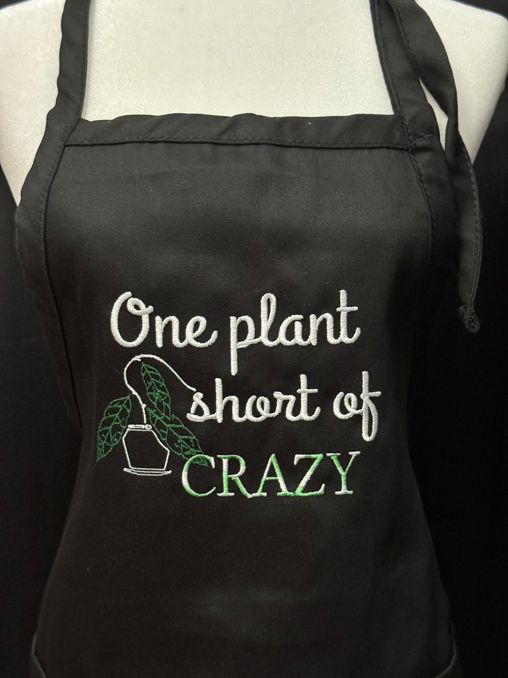 Apron with Pockets - adjustable straps - Embroidered "One Plant Short of Crazy w/Hoya Clemensorium